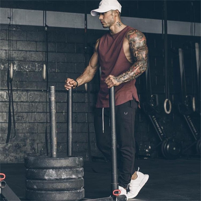 Brand Mens Curved Hem Patchwork Gyms Stringers Vest Bodybuilding Clothing Fitness Man Tanks Tops