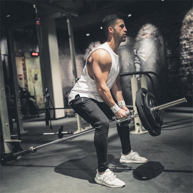 Brand Mens Curved Hem Patchwork Gyms Stringers Vest Bodybuilding Clothing Fitness Man Tanks Tops